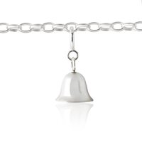 girl's bell charm on children's charm bracelet