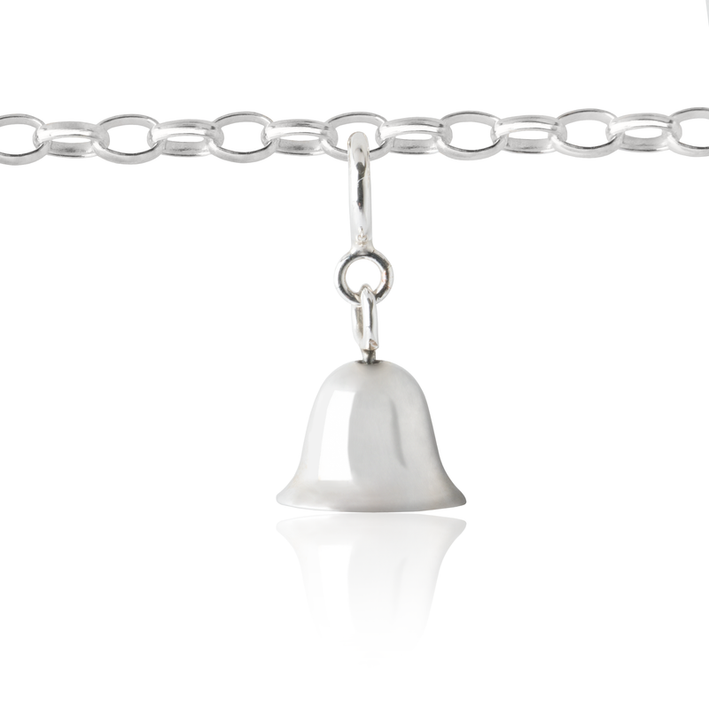 girl's bell charm on children's charm bracelet